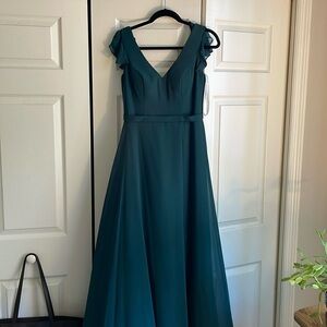 Floor length, teal, formal dress.
